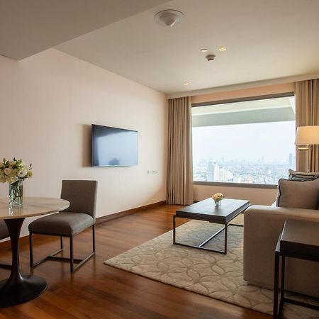 Avani Plus Riverside Bangkok Hotel Exterior photo Living room of a suite