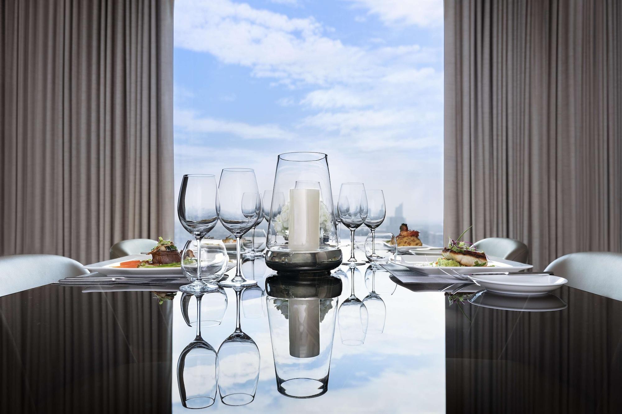 Avani Plus Riverside Bangkok Hotel Exterior photo A table set for a meal