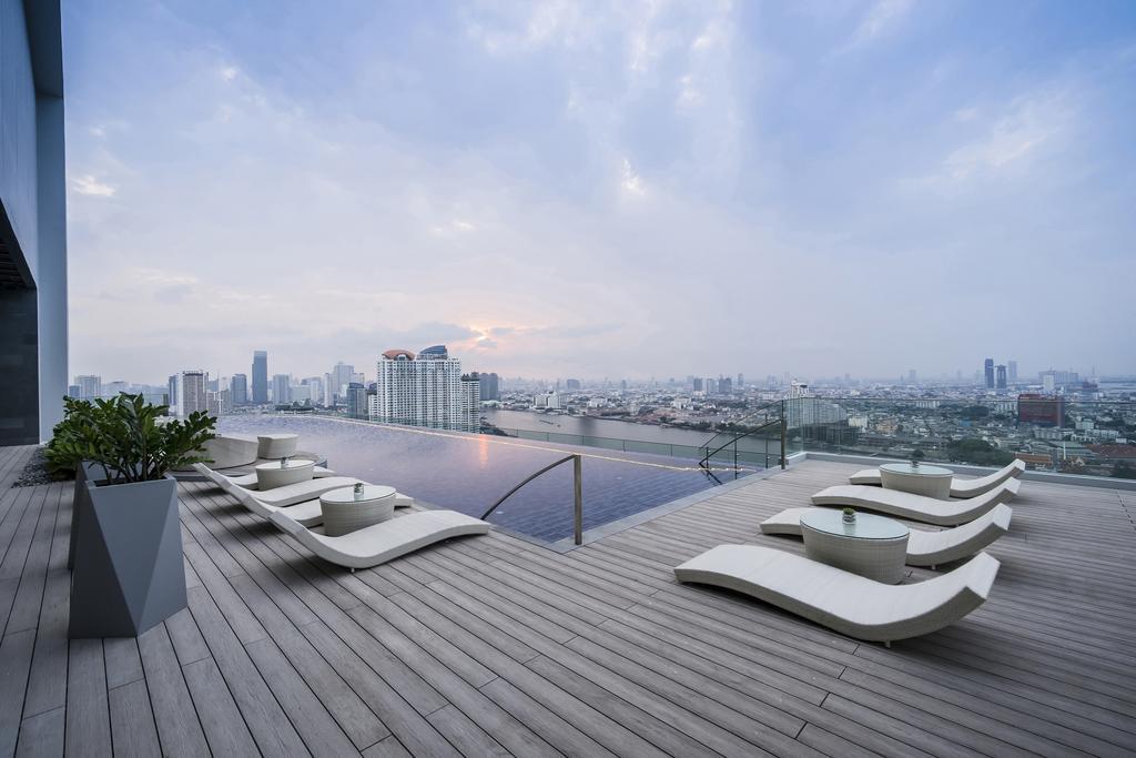 Avani Plus Riverside Bangkok Hotel Exterior photo The rooftop pool at the hotel