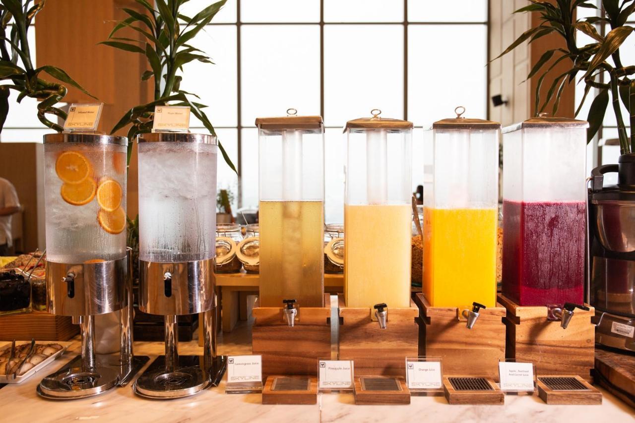 Avani Plus Riverside Bangkok Hotel Exterior photo A selection of fruit juices