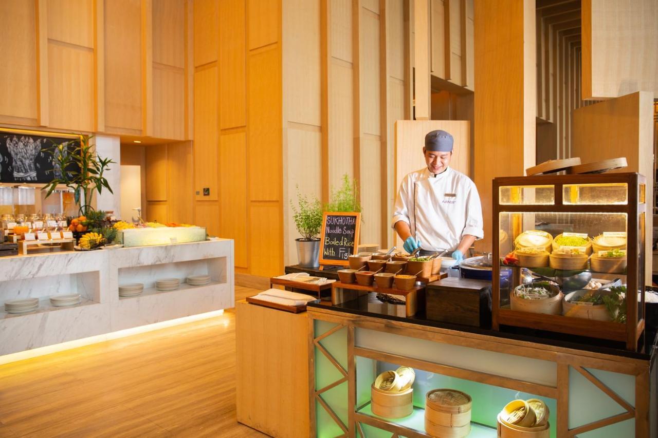 Avani Plus Riverside Bangkok Hotel Exterior photo A live kitchen at a hotel