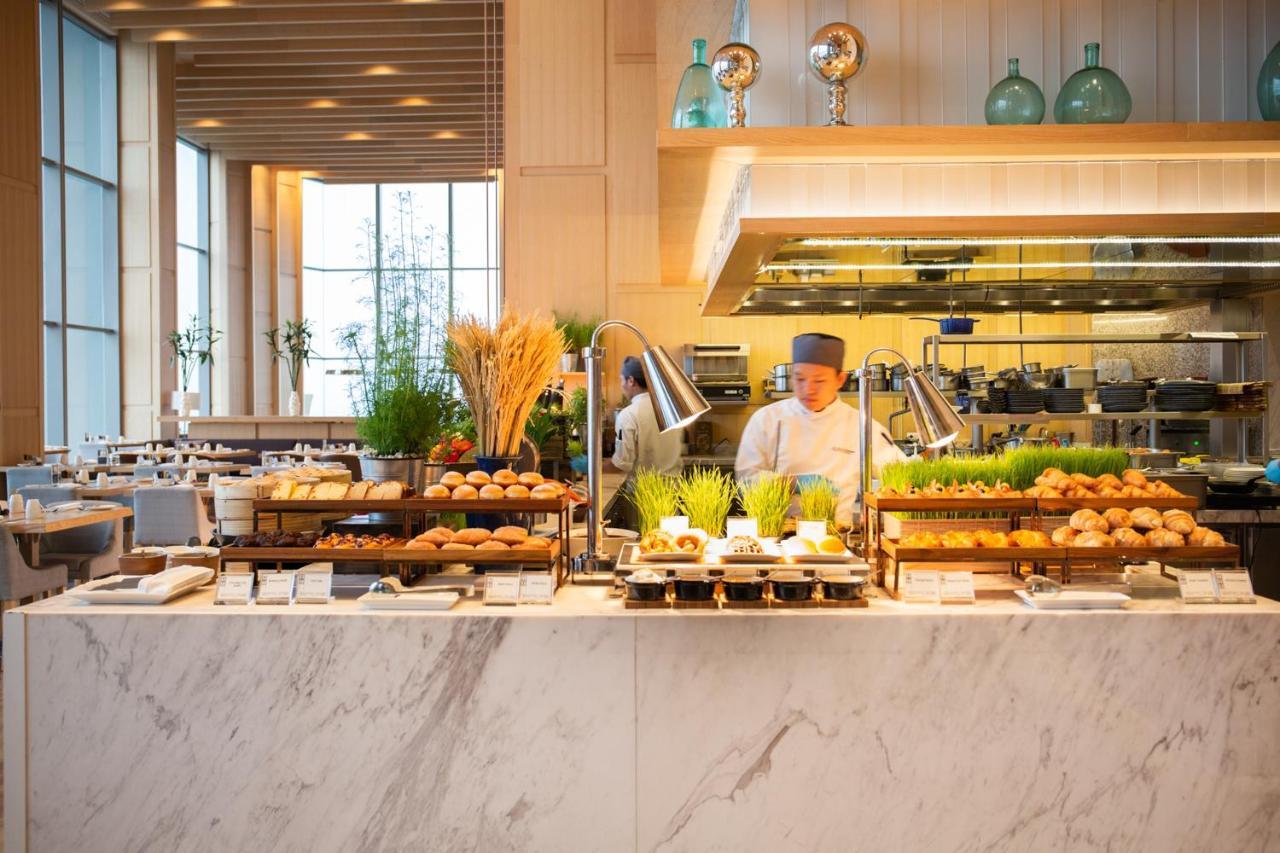 Avani Plus Riverside Bangkok Hotel Exterior photo A buffet at a hotel